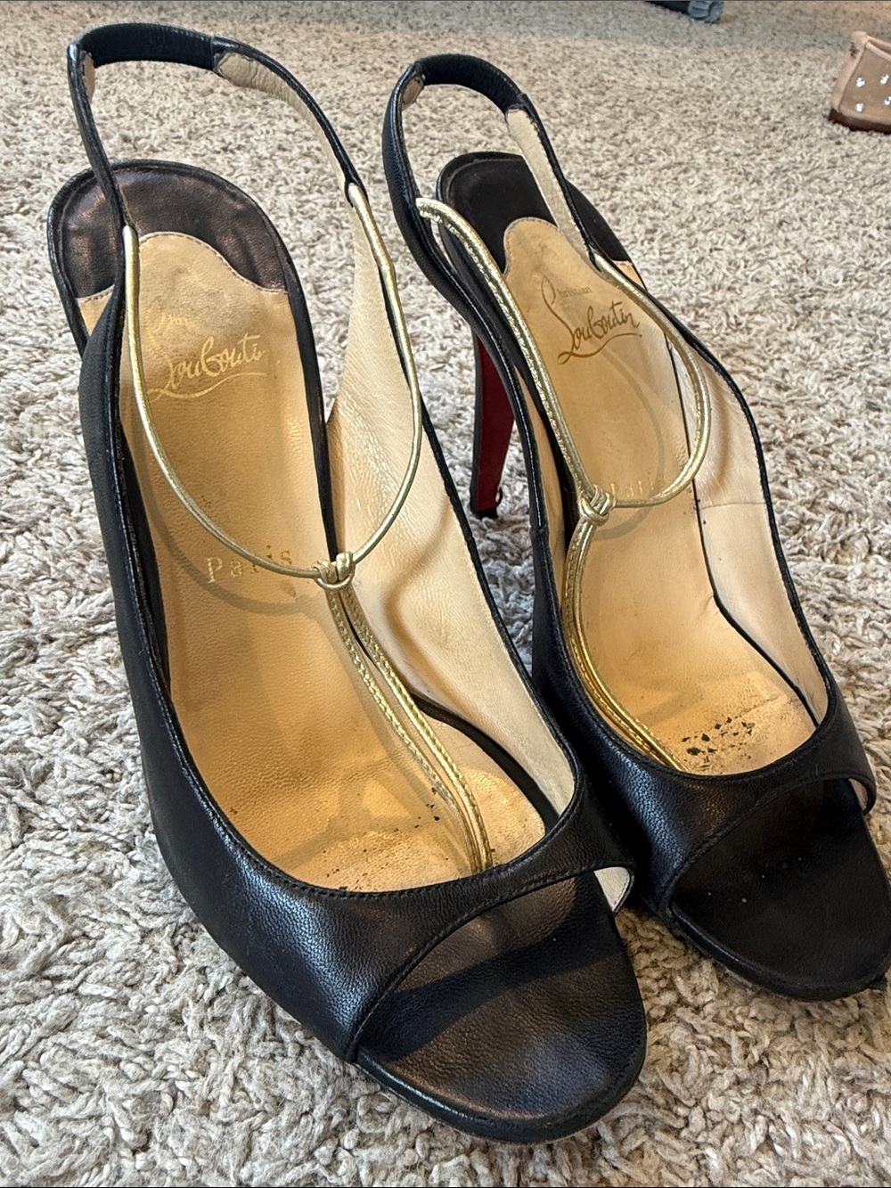 Christian Louboutin Athina Slingback Sandals
Black & Gold Leather